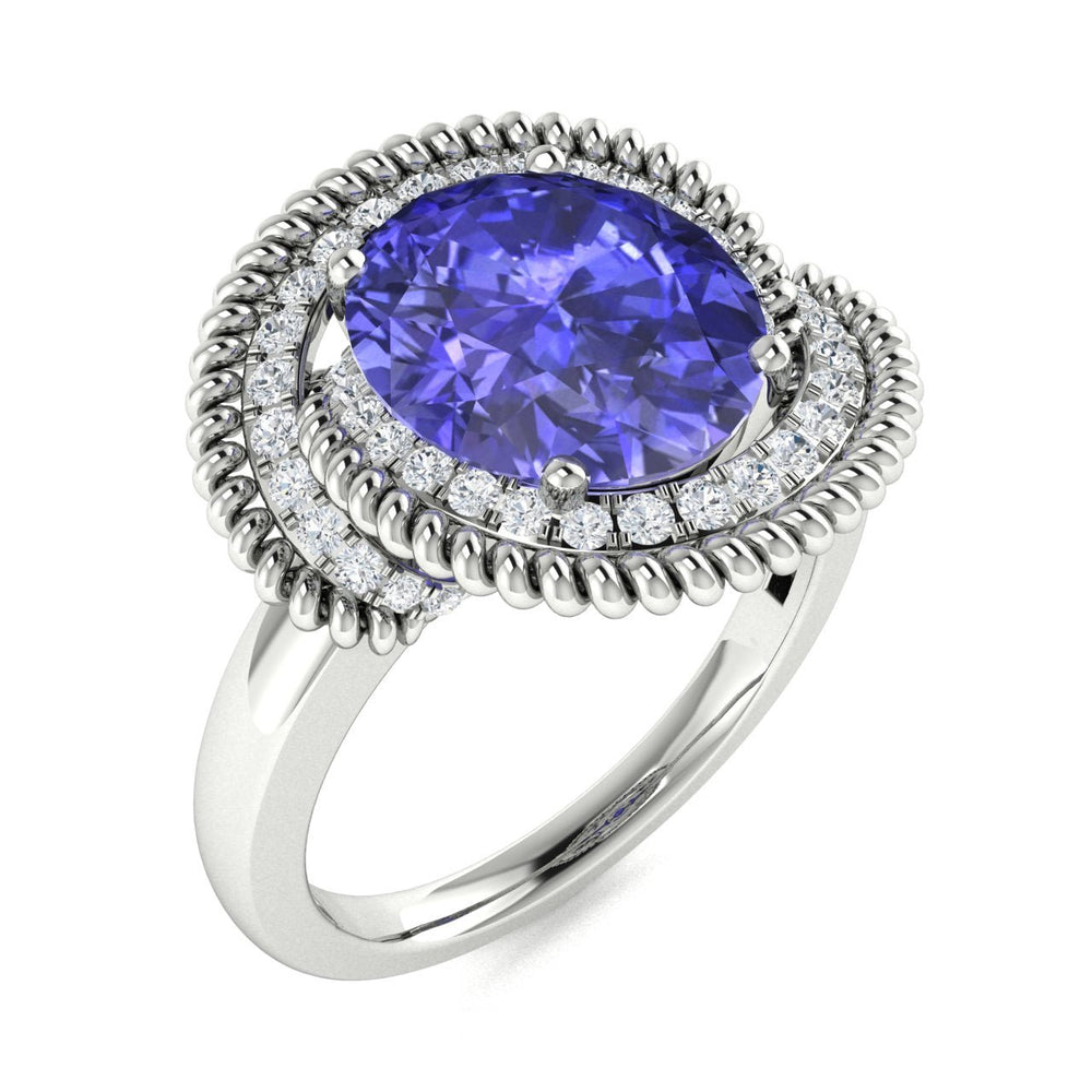 14KT Gold Oval Tanzanite and Diamond Ladies Ring (Tanzanite 3.00 cts. White Diamond 0.25 cts.)