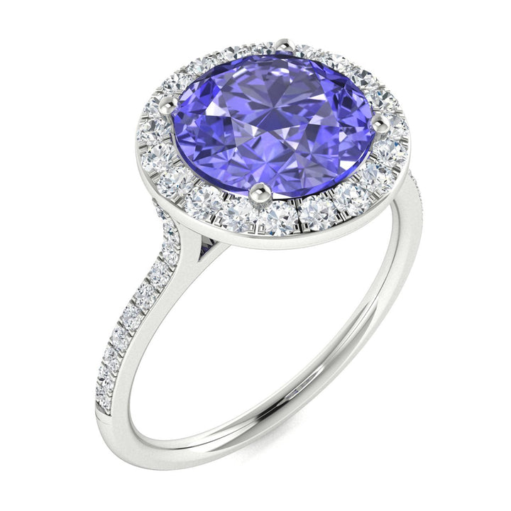 14KT Gold Round Brilliant Cut Tanzanite and Diamond Ladies Ring (Tanzanite 3.00 cts. White Diamonds 0.50 cts.)