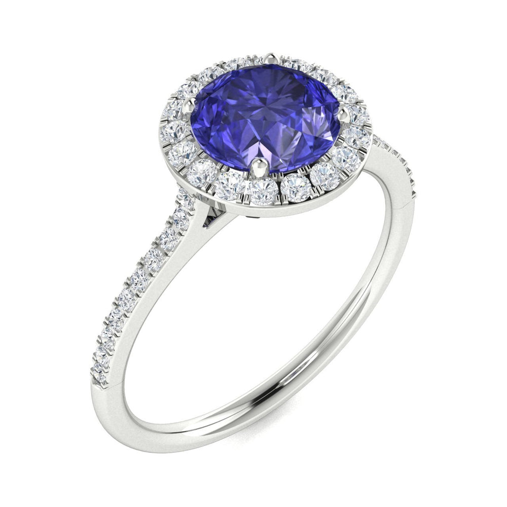 14KT Gold Round Brilliant Tanzanite and Diamond Ladies Ring (Tanzanite 0.90 cts. White Diamond 0.20 cts.)