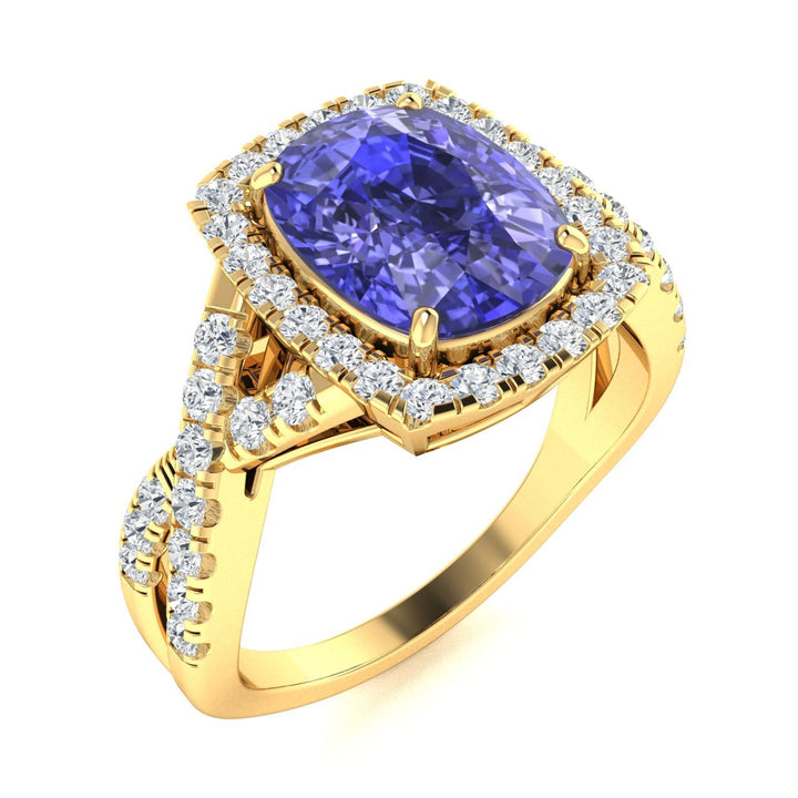 18KT Gold Cushion Tanzanite and Diamond Ladies Ring (Tanzanite 4.71 cts. White Diamond 0.71 cts.)