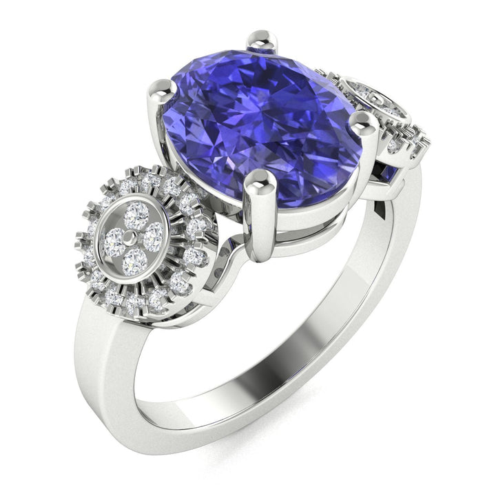 18KT Gold Round Tanzanite and Diamond Ladies Ring (Tanzanite 4.58 cts. White Diamond 0.16 cts.)