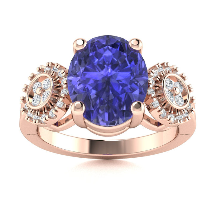 18KT Gold Round Tanzanite and Diamond Ladies Ring (Tanzanite 4.58 cts. White Diamond 0.16 cts.)